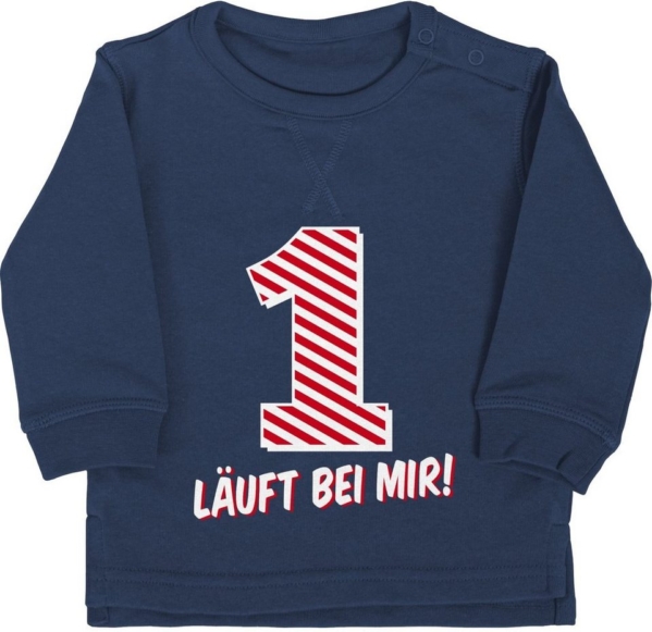 Shirtracer Sweatshirt »1. Geburtstag läuft bei mir – Baby Geburtstag Geschenk – Baby Pullover« Geburtstagsgeschenk Ideen Kleidung Strampler…